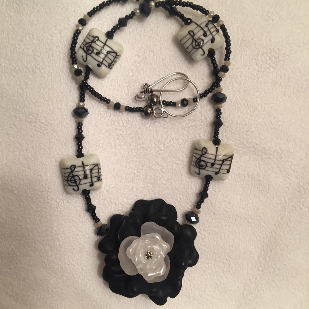 Musically-inspired necklace with handblown glass